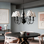 Cargar imagen en el visor de la Galería, Five-light polka dot chandelier installed above a round dining table