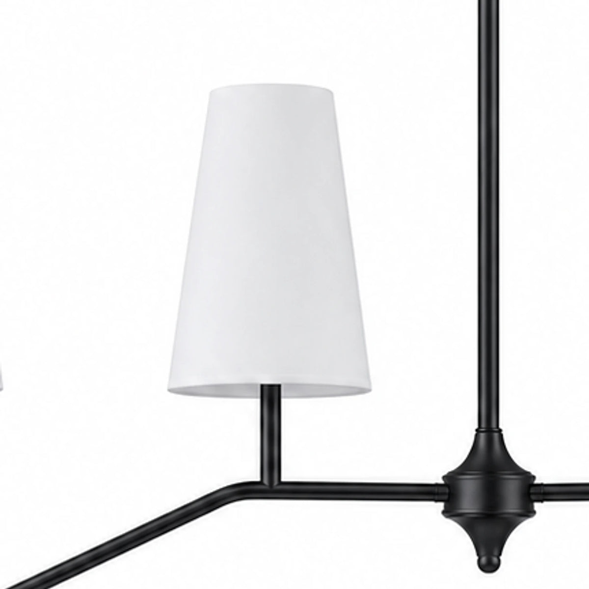 Black finish detail near white fabric shade and branch arm