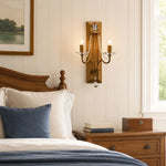 Cargar imagen en el visor de la Galería, Vintage brass crystal double wall sconce installed above a bedside table