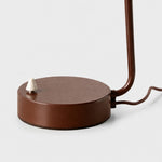 Bild in die Galerieansicht laden, Close-up of brown round lamp base and metal on-off switch