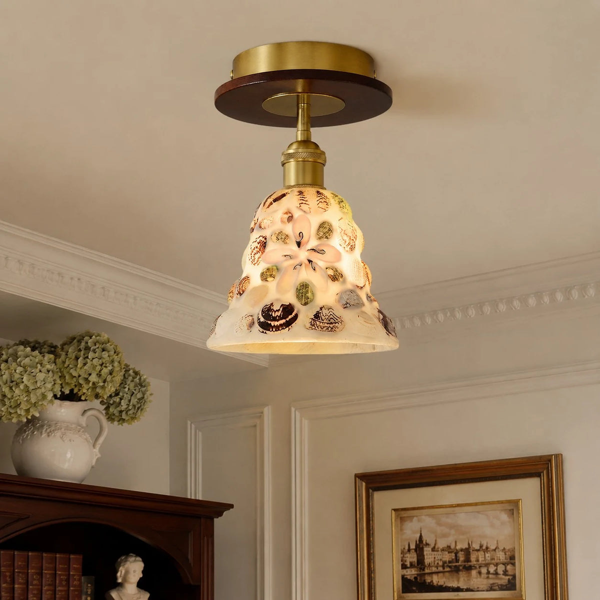 Shell glass ceiling light in a warm hallway scene