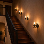 Afbeelding laden in galerijweergave, Kerosene style wall lamps lighting a stairway wall