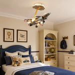 Cargar imagen en el visor de la Galería, Airplane ceiling light over a blue kids bed