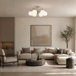 Load image into Gallery viewer, Glass globe chandelier in a neutral living room