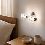 Załaduj obraz do przeglądarki galerii, Horizontal Bauhaus acrylic chrome wall lamp in a bedroom wall setting