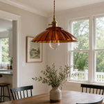 Cargar imagen en el visor de la Galería, Amber glass pendant over a wood dining table