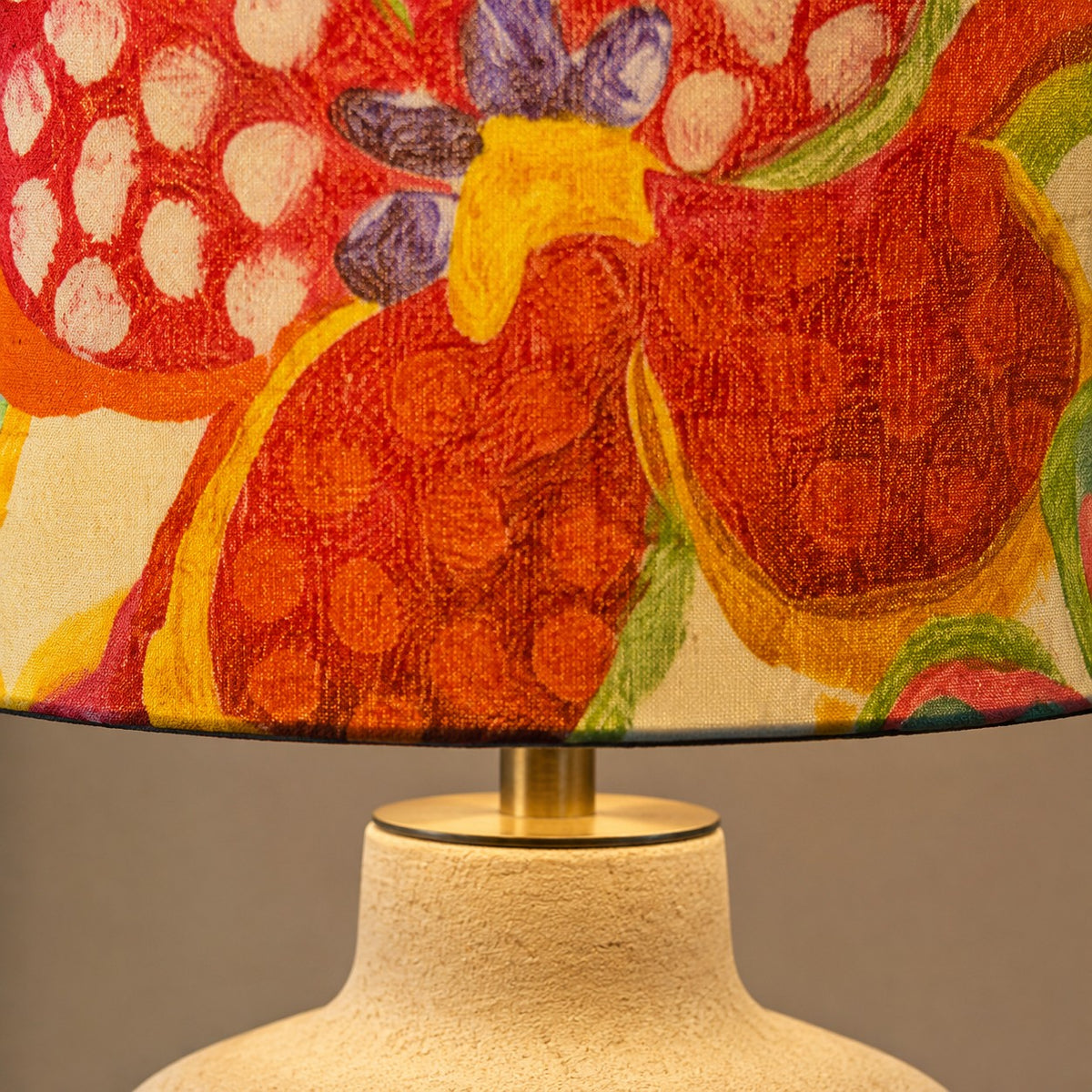Close-up of the floral shade and ceramic lamp neck