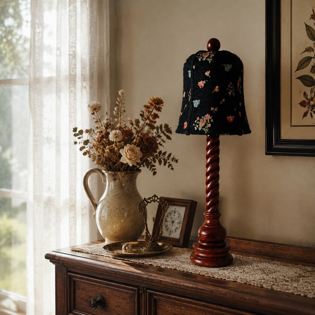 floral fabric and carved wood table lamp