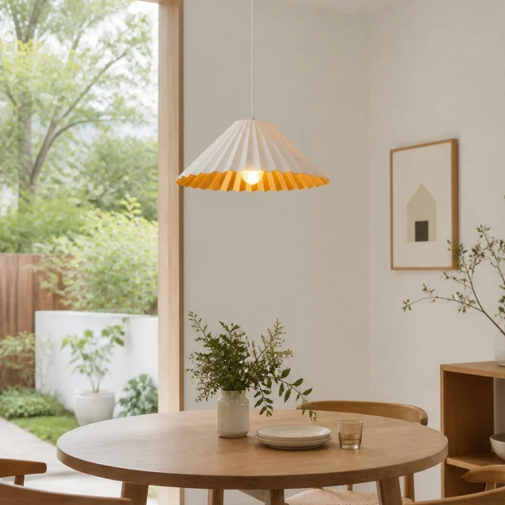 White metal dome pendant lamp in a bright dining nook