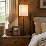Afbeelding laden in galerijweergave, Square fabric shade table lamp on a bedside table