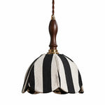 Cargar imagen en el visor de la Galería, Black and ivory striped fabric pendant lamp with dark wood handle and brass connector