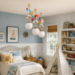 Cargar imagen en el visor de la Galería, Unicorn chandelier in bright nursery bedroom setting
