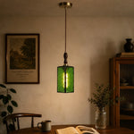Cargar imagen en el visor de la Galería, Green glass pendant installed in a warm interior