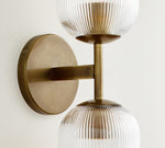 Load image into Gallery viewer, Bravira Ribbed Glass Sconce - Metal Wall Light with Clear Glass Shade

