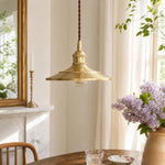 Load image into Gallery viewer, Polished brass pendant light in a bright European-inspired dining room