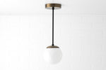 Load image into Gallery viewer, Glorica Glass White Globe Pendant Light - Mid Century Modern Glass Hanging Fixture
