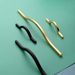 Load image into Gallery viewer, Curved Cabinet Handles – Minimalist Black Gold Cabinet Door Handle Set
