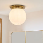Load image into Gallery viewer, Rivolence Flush Mount Ceiling Fixture - Minimal Globe Brass Lighting
