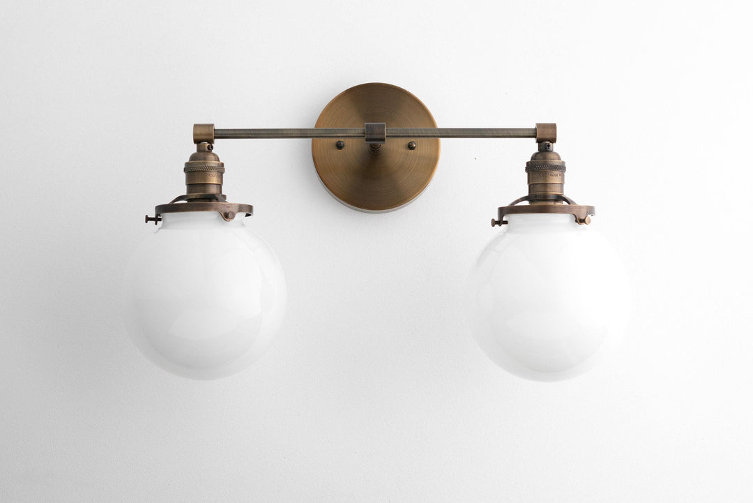Lumio Globe Glass Globe Vanity Light - Modern Two Light Bathroom Sconce