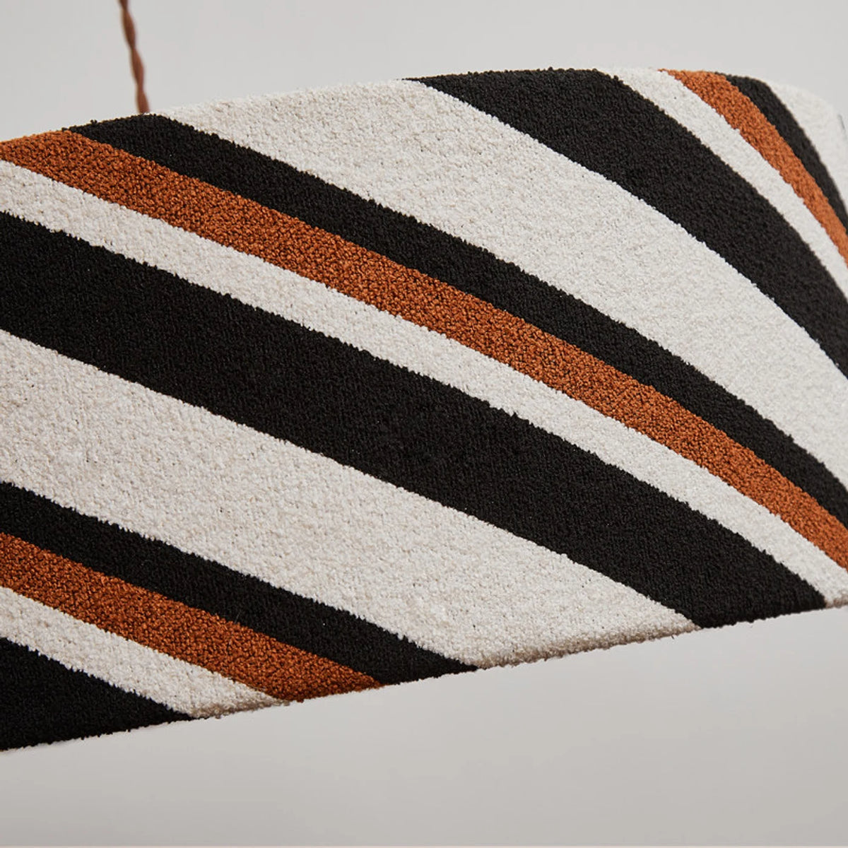 Striped fabric pendant light room detail