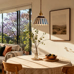 Cargar imagen en el visor de la Galería, Striped ceramic pendant lamp in a sunlit dining nook