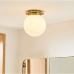 Load image into Gallery viewer, Rivolence Flush Mount Ceiling Fixture - Minimal Globe Brass Lighting
