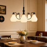 Afbeelding laden in galerijweergave, Vintage five-heads chandelier above a dining table