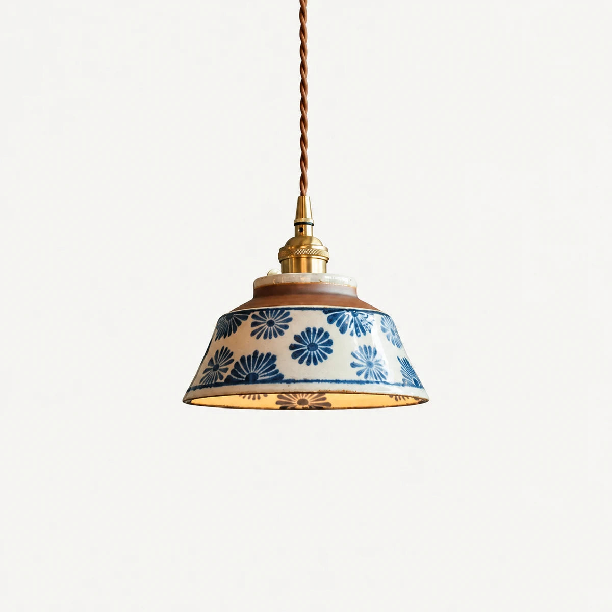Blue and white hand-painted ceramic pendant lamp with brass-tone socket