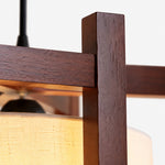 Bild in die Galerieansicht laden, Close-up of walnut finish frame grain and fabric shade