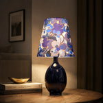 Afbeelding laden in galerijweergave, Blue floral fabric ceramic table lamp on a bedside table