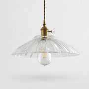 Transparent glass pendant light on white background