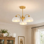 Load image into Gallery viewer, Milk glass chandelier in a bright traditional room