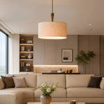 Załaduj obraz do przeglądarki galerii, Natural linen drum pendant lamp in a warm living room