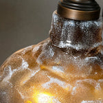 Cargar imagen en el visor de la Galería, Close detail of smoky gray textured glass shade with warm amber tone