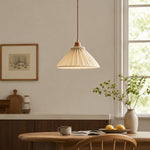 Load image into Gallery viewer, Natural linen pendant light above a quiet reading corner with wood furniture