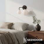 Load image into Gallery viewer, Merin Metal &amp; Glass Sculptural Wall Sconce for Vanity &amp; Bathroom
