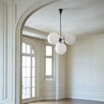 Load image into Gallery viewer, Ulvara Chandelie Linear Cluster Glass Globe Design - Contemporary Elegance
