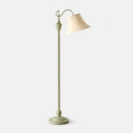 Carica l'immagine nella visualizzazione Galleria, Sage green curved-arm floor lamp with ivory fabric shade on a light background