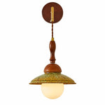 Cargar imagen en el visor de la Galería, Japanese wabi sabi wall sconce with walnut wood wall plate, brass arm, green textured shade and frosted globe