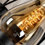 Załaduj obraz do przeglądarki galerii, Amber glass chimney shade and warm filament bulb detail