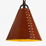 Cargar imagen en el visor de la Galería, Close view of red leather cone shade with gold rivets and stitched lower edge