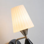 Carica l'immagine nella visualizzazione Galleria, Glass shade and wall arm detail of matte nickel wall sconce