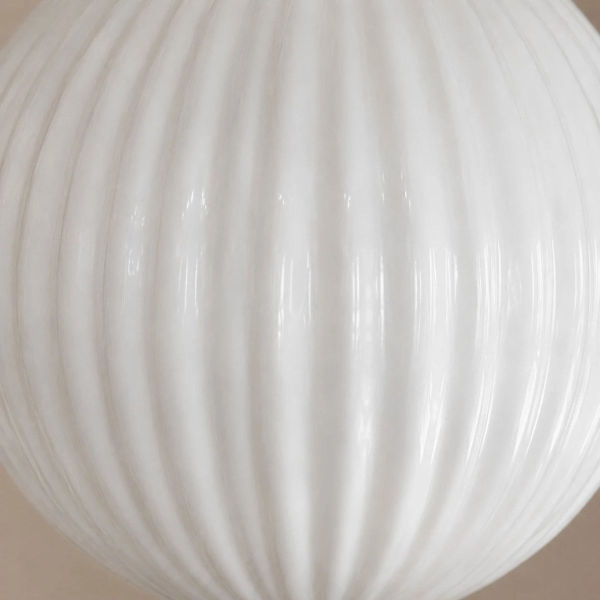 Close view of ribbed milk glass texture