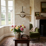 Load image into Gallery viewer, Curva Metal Modern Wall Sconce - Antique Brass Arm with Cream Disc Shade
