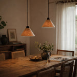 Cargar imagen en el visor de la Galería, Warm lit natural paper pendant lamps in a dining room