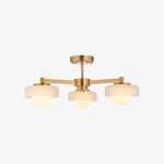 Bild in der Galerieansicht laden, Zirvos Pendelleuchte mit mattierten Opalgloben und gebürstetem Messingrahmen für Wohn- und Esszimmer