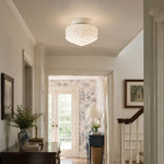 Afbeelding laden in galerijweergave, Embossed glass flush mount ceiling light in a bright hallway