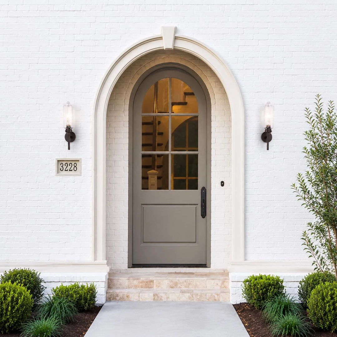 Pair of wall sconces beside an exterior entryway