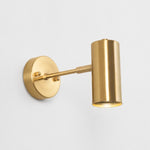 Carica l'immagine nella visualizzazione Galleria, Brushed brass cylinder wall sconce on a white background