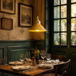 Cargar imagen en el visor de la Galería, Yellow glazed ceramic pendant light over a vintage restaurant table